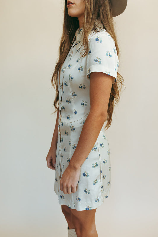 West shirt dress in Kindred Floral, studio side view showing the cuffed short sleeves