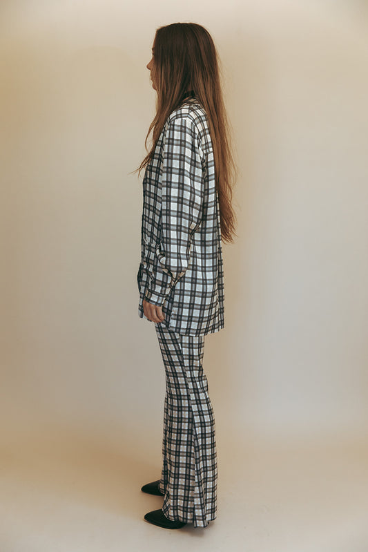 Bobbi blouse in Retro Plaid, studio side view showing the longline untucked fit