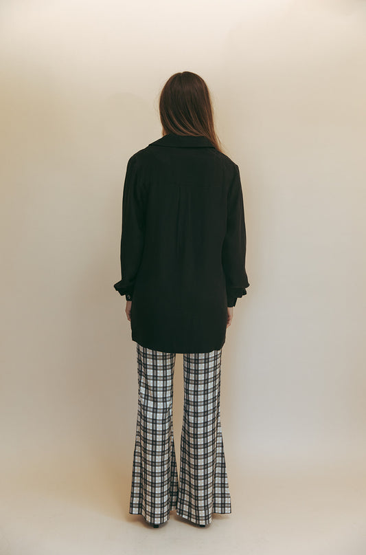 Bobbi blouse in Washed Black, studio back view showing the back yoke and cuffed sleeves
