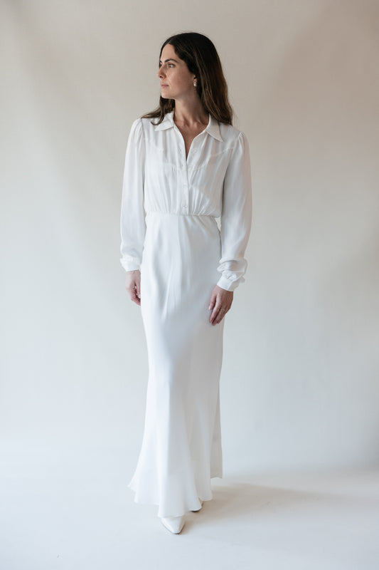 Dahlia maxi dress in Cloud, studio front view showing the pointed collar and gathered waist