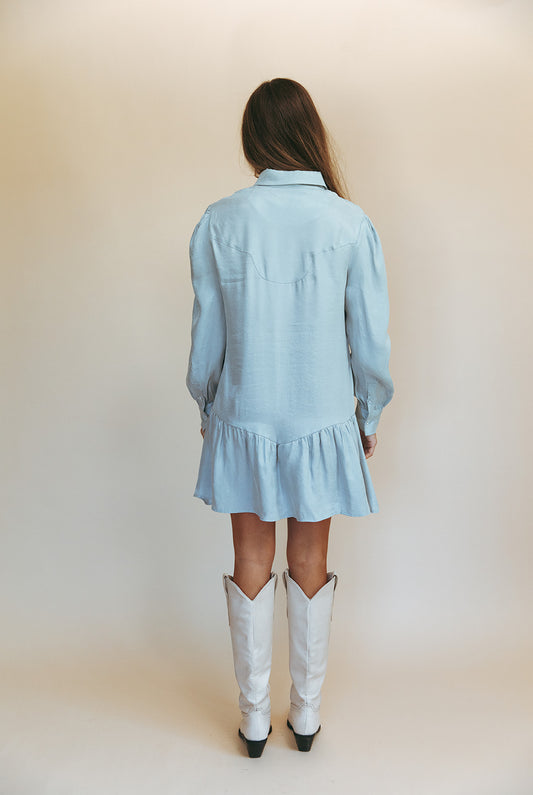 Sienna mini dress in Hazy Blue, studio back view showing the Western yoke