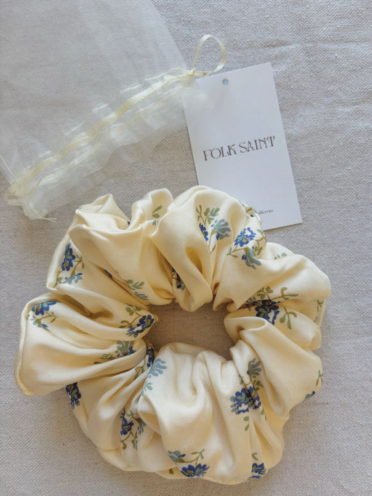 Oversized scrunchie in Kindred Floral, flat lay close-up showing the blue floral print