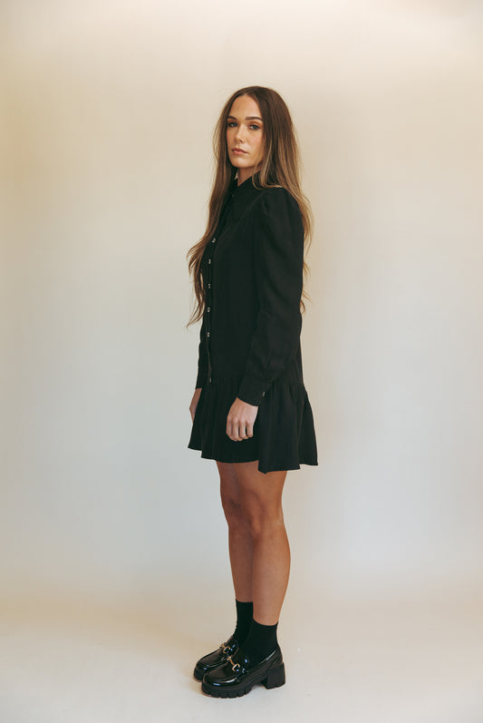 Sienna mini dress in Washed Black, studio side view with black loafers and socks